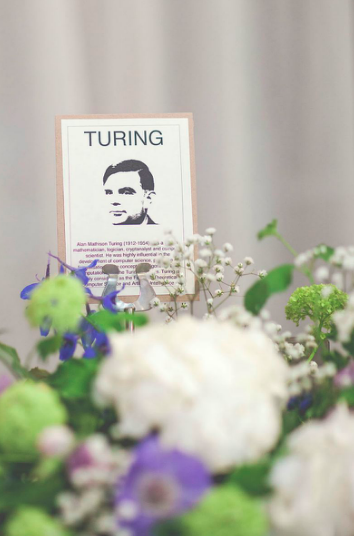 Alan Turing's face as a table decoration at a wedding