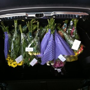 Bunches of Flowers in the back of a car